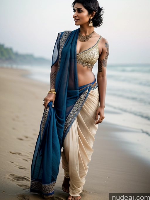 ai nude image of araffe woman in sari walking on the beach with a blue sari pics of Woman Beautiful Tattoos Black Hair Pixie 30s Beach Sari Indian Dark Skin